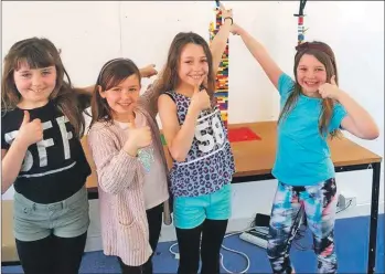  ??  ?? ‘The girls absolutely dominated at the tallest tower building competitio­n,’ Lego Club organiser Fee Shaw said.