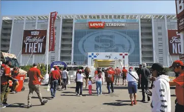  ?? JOSIE LEPE — STAFF ARCHIVES ?? San Francisco 49ers fans make their way into the stadium before a game against the Carolina Panthers at Levi’s Stadium in Santa Clara in September.