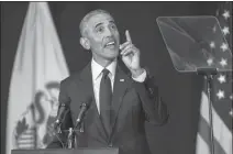  ?? STEPHEN HAAS//THE NEWS-GAZETTE VIA AP ?? FORMER PRESIDENT BARACK OBAMA speaks in Foellinger Auditorium on the University of Illinois campus in Urbana, Ill., on Friday.