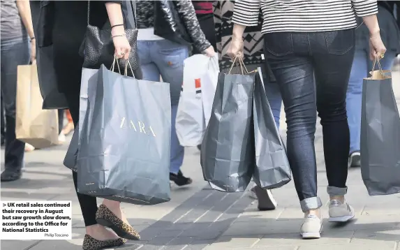  ?? Philip Toscano ?? UK retail sales continued their recovery in August but saw growth slow down, according to the Office for National Statistics