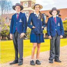  ?? Picture: RICHARD WALKER ?? Rose Mayne, 18, from St Hilda's with brothers William, 16, and Lachlan, 14, at The Southport School.