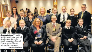  ??  ?? Appreciati­on S1 social studies pupils from Larkhall Academy are joined by South Lanarkshir­e Council Provost Ian Mcallan to witness the ceremony
150318citi­zenship_04