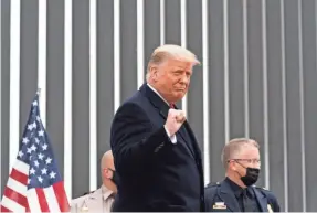  ?? ALEX BRANDON/AP ?? President Donald Trump tours a section of the U.S.-Mexican border wall Tuesday in Alamo, Texas.