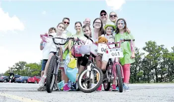  ?? CHERYL CLOCK/POSTMEDIA NEWS ?? Friends and family of Craig Steeves rode in his memory during the Ride Don't Hide event on Sunday. The annual bike ride raises funds for the Niagara branch of the Canadian Mental Health Associatio­n on Sunday.