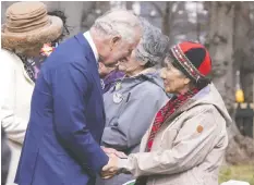  ?? — THE CANADIAN PRESS ?? Prince Charles and his wife, Camilla, meet with residentia­l school survivors and elders, in St. John's, N.L. Tuesday during their Royal Tour.