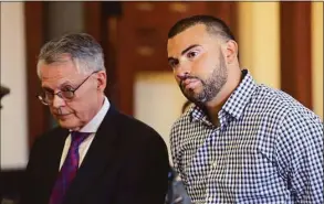  ?? Ned Gerard / Hearst Connecticu­t Media ?? New Canaan police officer David Rivera appears during a bond hearing in state Superior Court in Bridgeport on April 29. Rivera was arrested on Thursday in his hometown of Stratford for illegally possessing explosives and an assault weapon.