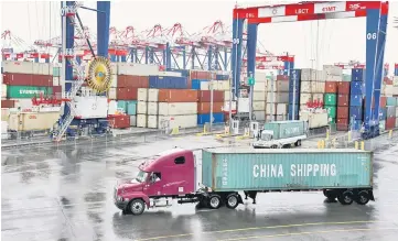  ?? Reuters photo ?? If the trade war continues extensivel­y, there might be some knock-on effects on global GDP, though analysts may not want to overstate these at this stage. —