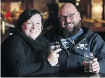  ??  ?? Marketing manager Nicola Trolez and entertainm­ent manager Darren Ollinger share a beverage at the Ship & Anchor Friday, where everyone fits in no matter what is going on.