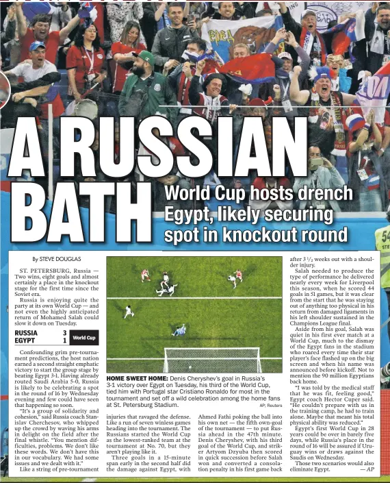  ?? AP; Reuters ?? HOME SWEET HOME: Denis Cheryshev’s goal in Russia’s 3-1 victor y over Egypt on Tuesday, his third of the World Cup, tied him with Por tugal star Cristiano Ronaldo for most in the tournament and set off a wild celebratio­n among the home fans at St....