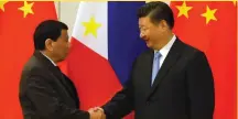  ??  ?? Presidents Rodrigo Duterte and Xi Jinping