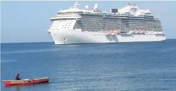  ??  ?? A cruise ship enters the port in Montego Bay.