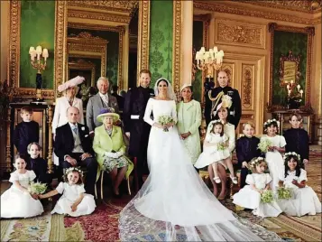  ?? PHOTO BY ALEXI LUBOMIRSKI ?? Pages, bridesmaid­s and members of the royal family Jasper Dyer (back row, from left), the Duchess of Cornwall, the Prince of Wales, the Duke and Duchess of Sussex, Doria Ragland (mother of the bride), the Duke of Cambridge, Brian Mulroney (middle, from...