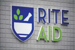 ?? GENE J. PUSKAR THE ASSOCIATED PRESS ?? Rite Aid, a major U.S. pharmacy chain, said Sunday it had reached an agreement with some key creditors on a financial restructur­ing plan to cut its debt. The company also said it obtained $3.45 billion in fresh financing from some of its lenders.