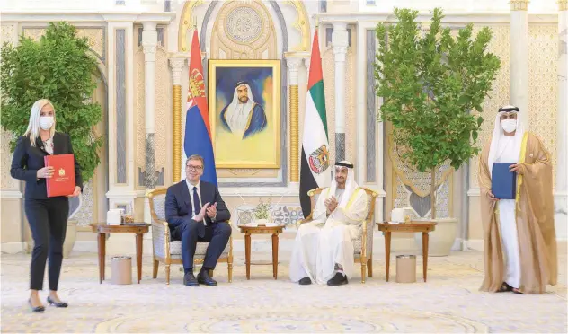  ?? WAM ?? ↑ Sheikh Mohamed Bin Zayed and Aleksandar Vucic attend an MOU signing ceremony at Qasr Al Watan.
