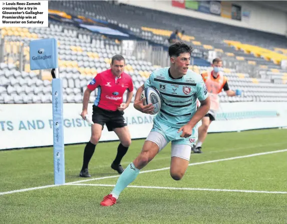  ??  ?? > Louis Rees-Zammit crossing for a try in Gloucester’s Gallagher Premiershi­p win at Worcester on Saturday