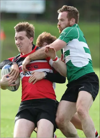  ??  ?? Wicklow’s Ben Porter comes under pressure.