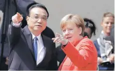  ?? FOTO AP ?? Li Keqiang y Angela Merkel se reunieron en Berlín.