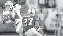  ?? SUN SENTINEL FILE ?? Former Dolphins standout receiver Chris Chambers joins the college coaching ranks.