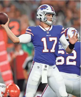  ??  ?? Bills quarterbac­k Josh Allen passes against the Browns during a preseason game Friday in Cleveland.