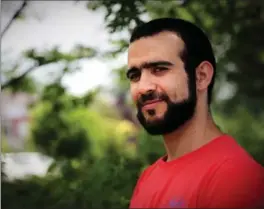  ?? COLIN PERKEL, THE CANADIAN PRESS ?? Former Guantanamo Bay prisoner Omar Khadr, 30, has been paid $10.5 million and has received an apology from the federal government.