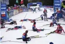  ?? ?? Skiers: ‘Welcome to 2022.’ Photograph: Giovanni Auletta/AP