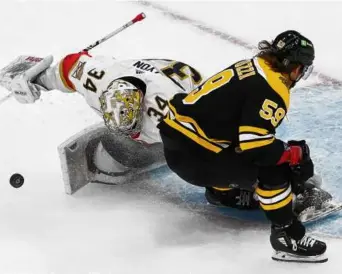  ?? BARRY CHIN/GLOBE STAFF ?? Bruins winger Tyler Bertuzzi had a pair of assists in his NHL playoff debut.