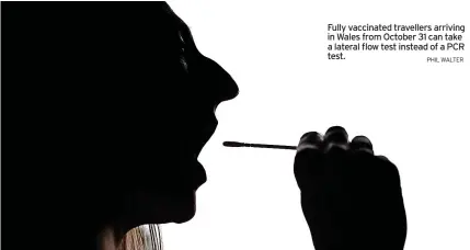  ?? PHIL WALTER ?? Fully vaccinated travellers arriving in Wales from October 31 can take a lateral flow test instead of a PCR test.