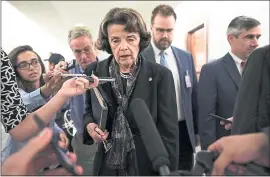  ?? ALEX WONG — GETTY IMAGES ?? Sen. Dianne Feinstein leaves after Senate Judiciary Committee voted to advance Brett Kavanaugh’s nomination, after securing a vote from Sen. Jeff Flake, R-Ariz., who asked for a delay of up to a week before the full Senate decides the judge’s fate.