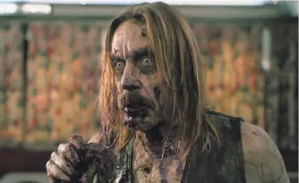  ?? FREDERICK ELMES/FOCUS FEATURES ?? Iggy Pop stars as a coffee zombie in Jim Jarmusch’s “The Dead Don’t Die.”