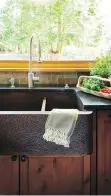  ??  ?? Deep, farmhouse-style trough sinks continue to be popular, but new hues and materials will personaliz­e spaces.