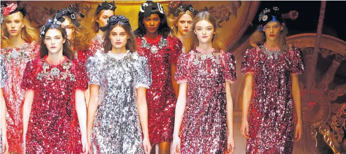  ?? STEFANO
RELLANDINI/
REUTERS ?? Models in sequinned dresses on the catwalk for the Dolce &amp; Gabbana autumn/ winter 2016 collection during Milan Fashion Week