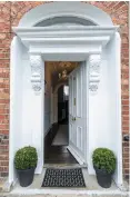  ??  ?? Clockwise from above: The kitchen with fireplace; landing; 78 Heytesbury Street is a period redbrick over three levels; the drawing room leads through to the kitchen/dining room; the renowned Bretzel Bakery, and, the front door of No. 78