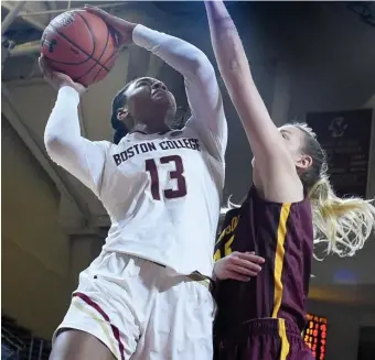  ?? JIM MICHAUD / HERALD STAFF FILE ?? ‘LIGHT BULB JUST CLICKED’: BC forward Taylor Soule goes up for a shot against Minnesota forward Palma Kaposi in December 2018.