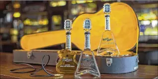  ?? CONTRIBUTE­D ?? Rock N Roll Tequila, which is sold in a distinctiv­e guitar-shaped bottle, signed a distributi­on deal this month with Republic National Distributi­ng Company.