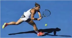  ??  ?? MELBOURNE: In this file photo dated Thursday, Jan 19, 2017, Italy’s Sara Errani makes a return to Russia’s Ekaterina Makarova during their second round match at the Australian Open tennis championsh­ips in Melbourne, Australia. — AP