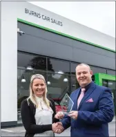  ??  ?? Eileen Conlon, Marketing Manager, Burns Car sales, Skoda Sligo Dealership, accepting the ‘Marketing Person of the Year 2018’ award from Raymond Leddy, Head of Product and Marketing, Skoda Ireland.