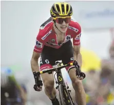  ?? AP FILE PHOTO ?? FOLLOW THE LEADER: Simon Yates of Great Britain holds the lead of the Spanish Vuelta cycling race heading into the Pyrenees Mountains for the next two days of racing.