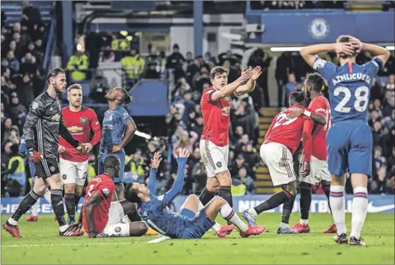  ?? Photo: Mike Hewitt/getty Images ?? Denied: Harry Maguire of Manchester United appeals to the referee after Kurt Zouma of Chelsea scores a goal, which is later disallowed for a foul during a Premier League match in October.