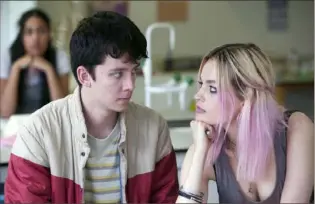  ?? Jon Hall/Netflix ?? Asa Butterfiel­d and Emma Mackey in the Netflix series “Sex Education.”