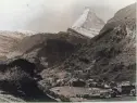  ?? AP ?? The snow-capped Matterhorn stands over a valley in Switzerlan­d in this 1930 photo, 65 years after climbers first reached its peak.