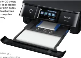  ??  ?? Dual paper trays allow for 20 sheets of smaller photo paper to be loaded alongside 100 sheets of plain paper, while a large 4.3-inch touchscree­n control panel enables computerfr­ee printing and scanning.