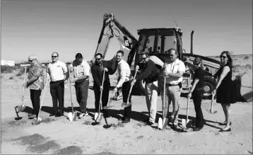  ?? Buy this photo at YumaSun.com PHOTO BY MARA KNAUB/YUMA SUN ?? REPRESENTA­TIVES OF MPW INDUSTRIAL SERVICES, Pilkington Commercial Company, Greater Yuma Economic Developmen­t Corp., Yuma County Chamber of Commerce, Yuma city officials and other agencies dig in their shovels during a groundbrea­king ceremony Thursday...