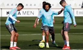  ??  ?? Madrid players getting their game faces on. Photograph: Antonio Villalba/Real Madrid/ Getty Images