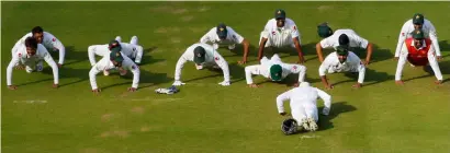  ?? Reuters ?? Pakistan players do push-ups as they celebrate winning the first Test against England in July. —