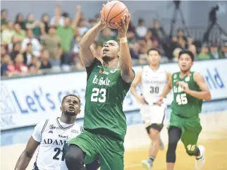  ?? ALVIN S. GO ?? BEN MBALA led the De La Salle Green Archers to an 85-73 victory over the Adamson Soaring Falcons in his UAAP Season 80 debut yesterday.