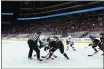  ?? CHRISTIAN PETERSEN — GETTY IMAGES ?? The San Jose Sharks’ Evander Kane (9) faces off against the Arizona Coyotes’ Derick Brassard (16) at Gila River Arena on Jan. 16 in Glendale, Ariz.