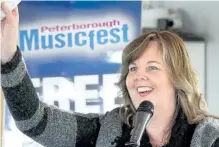  ?? JASON BAIN/EXAMINER ?? Peterborou­gh Musicfest general manager Tracey Randall speaks during the launch of the 2017 lineup at the Silver Bean CafÈ on Tuesday. This year's lineup includes shows from Tom Cochrane, The Sheepdogs and Jason McCoy.