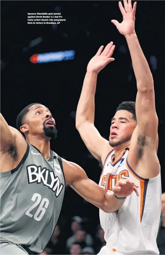  ?? AP ?? Spencer Dinwiddie gets bucket against Devin Booker (r.) but it’s Caris LeVert (inset) who jumpstarts Nets in victory in Brooklyn.