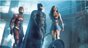  ??  ?? The Flash (Ezra Miller), Batman (Ben Affleck) and Wonder Woman (Gal Gadot) didn’t have the expected box office muscle. WARNER BROS. ENTERTAINM­ENT VIA AP