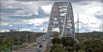  ?? Matt stone / boston Herald ?? traffic crosses the sagamore bridge. this summer, cape cod is looking at a major comeback, with rentals in high demand as people look for a vacation escape in easy reach.